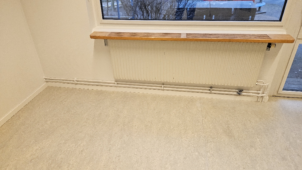 Efter: Vattenskada vid radiator – Barkarby
